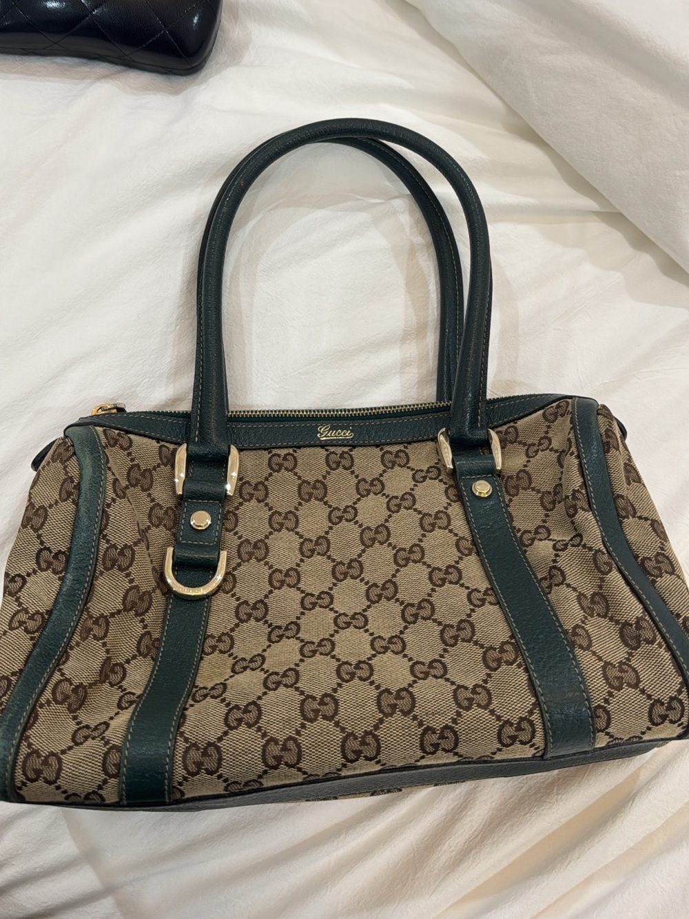 Gucci Small GG Canvas Abbey D-
Ring Boston Bag